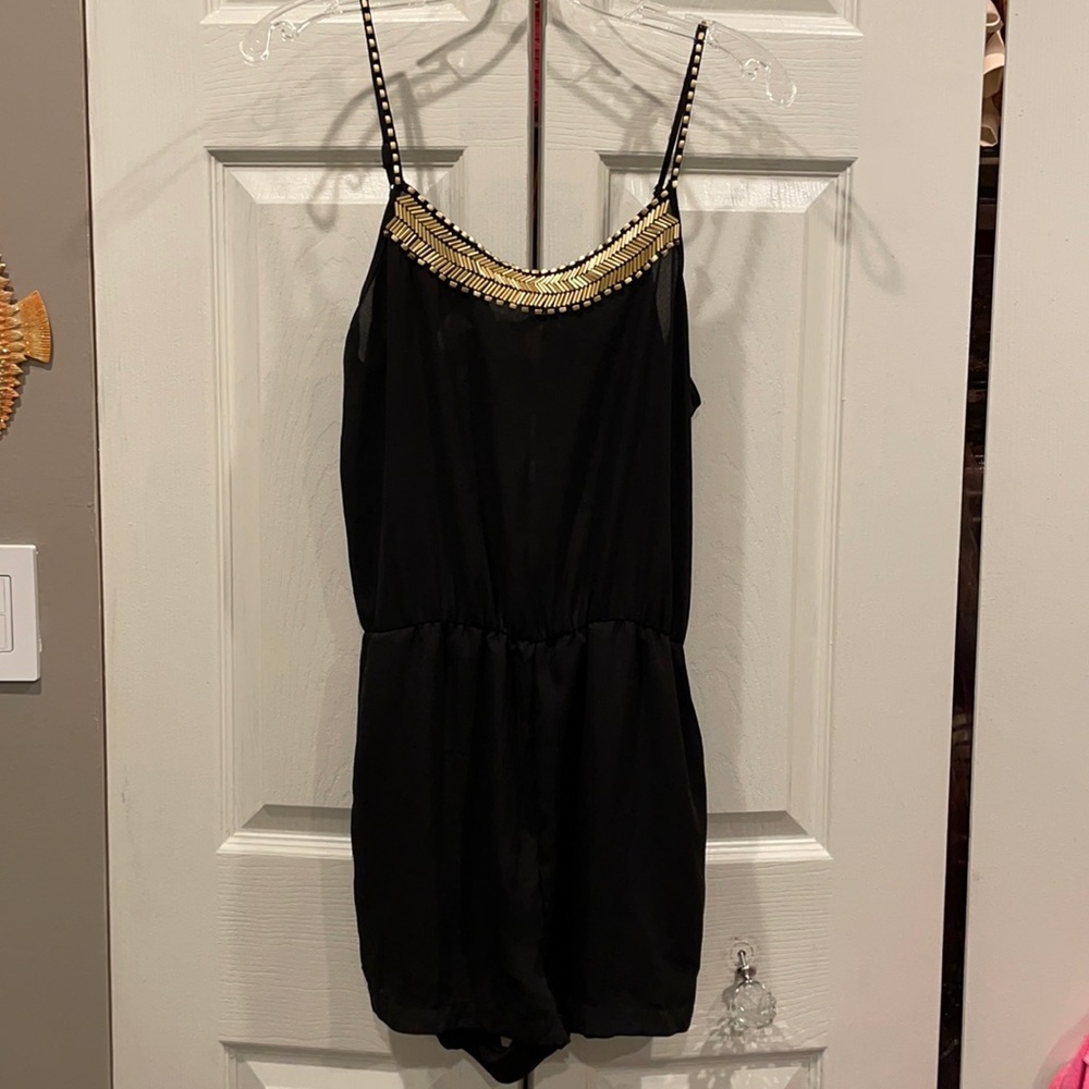 Leola couture black romper with gold detail